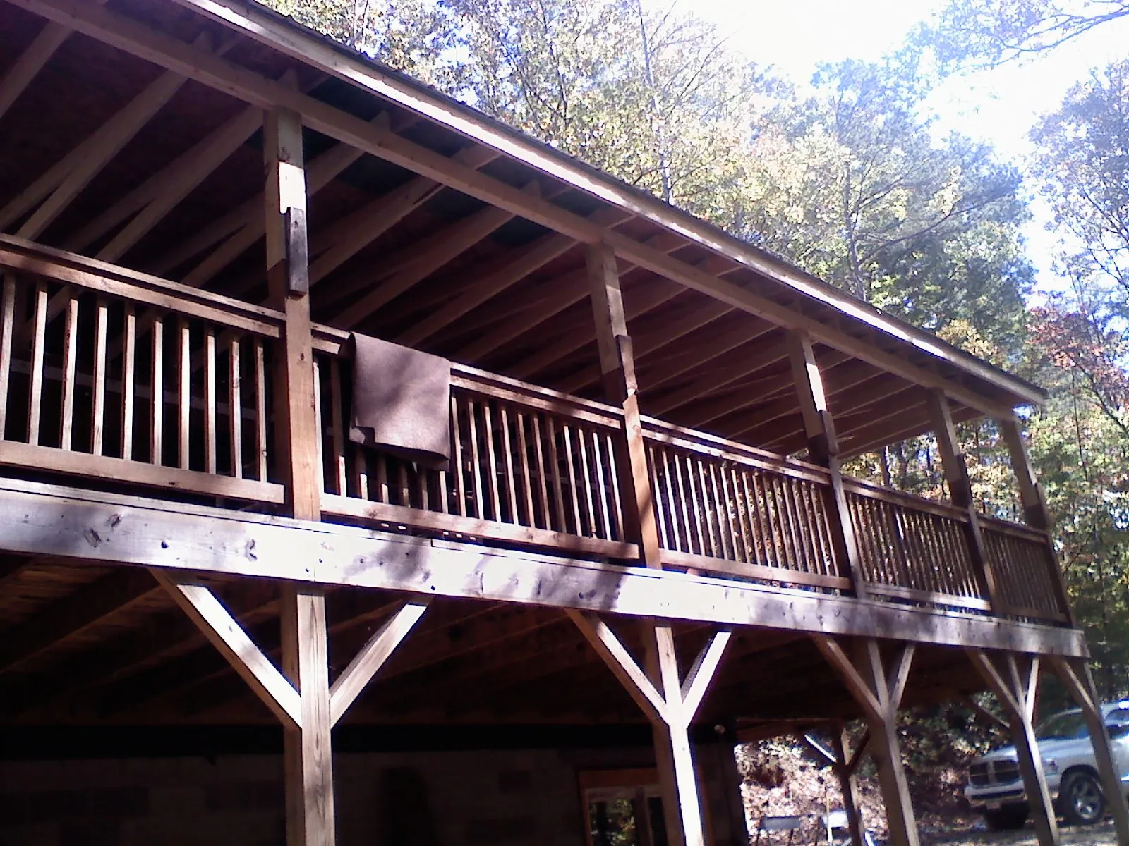 Timber framing under a new elevated porch and deck — Roof Leak Repair in Pawlet by Roofing Brothers